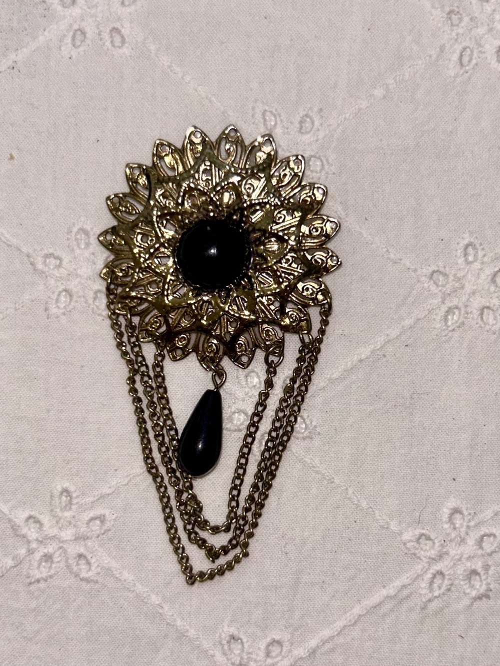 Gold Brooch with Black Accent